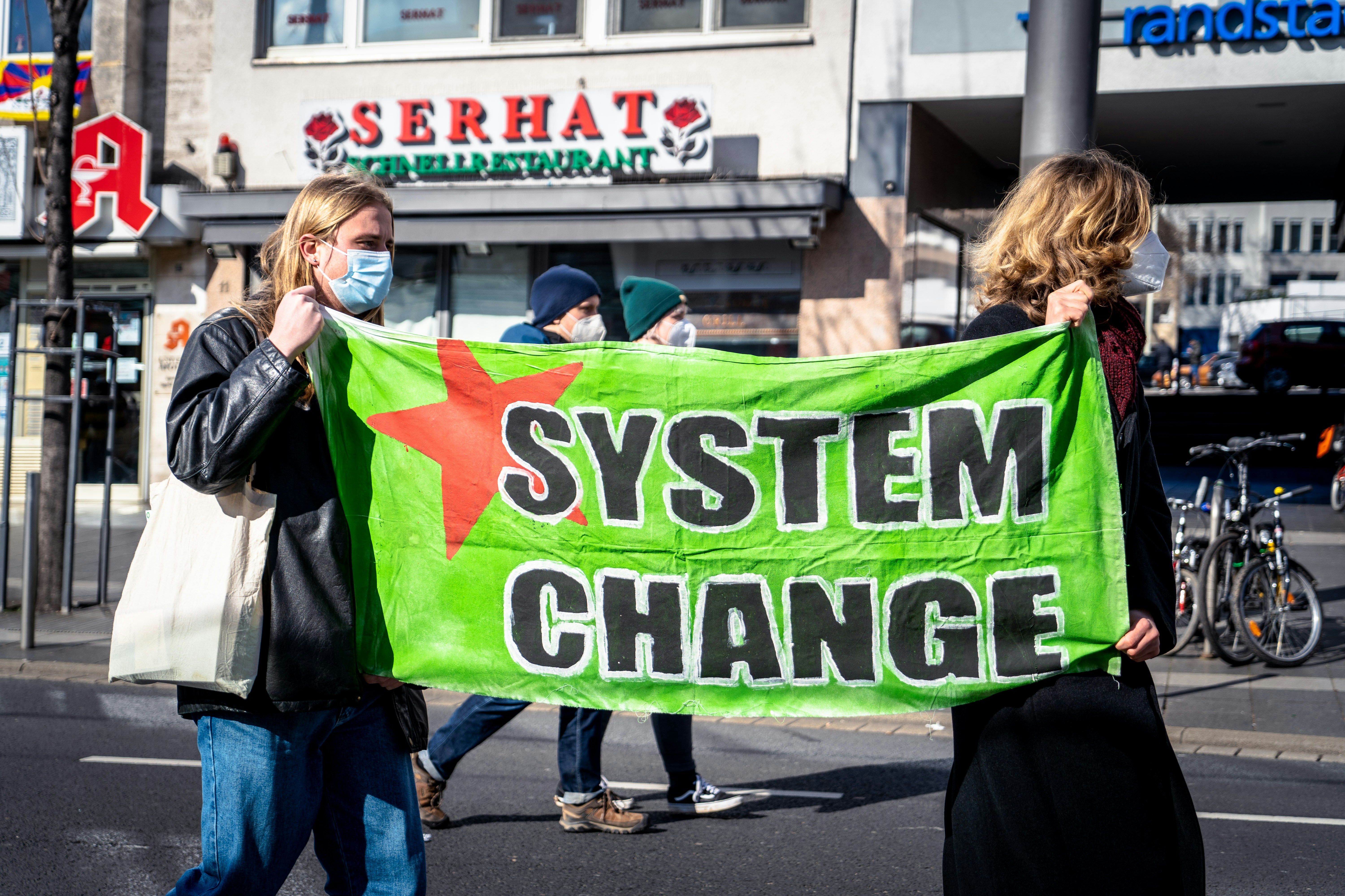 Young activists holding a banner